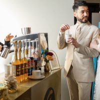 Newlywed couple enjoying the Espresso Dave Coffee Catering experience at their fall wedding reception.