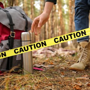 Clean your travel thermos bacteria warning with caution tape outdoors.
